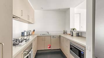 Coffee/tea maker, fridge, microwave, oven
