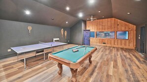 A billiards room with two tables, a pool table, and a ping pong table. - Heated Indoor Private Pool | Stream Front | Game Room (Cresco)