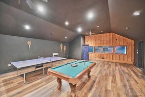 A billiards room with two tables, a pool table, and a ping pong table. - Heated Indoor Private Pool | Stream Front | Game Room (Cresco)