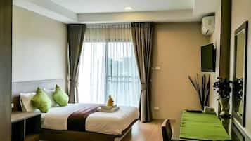 Desk, laptop workspace, free WiFi, bed sheets