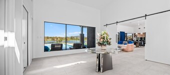 Luxury Lakefront Getaway | 6BR Home w/ Pool & Cinema