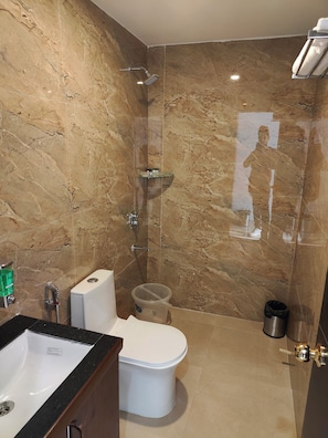 Shower, towels, soap, shampoo