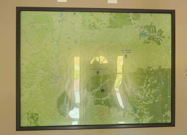 A framed map with locations such as Hecking Hills State Forest, Tar Hollow State Forest, and Tranquil Heights Cabin marked. - Secluded Hocking Hills Cabin with Hot Tub (Ray)