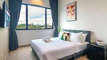 Estudio Deluxe, vista a la ciudad | Cortinas blackout, tabla de planchar con plancha y wifi gratis