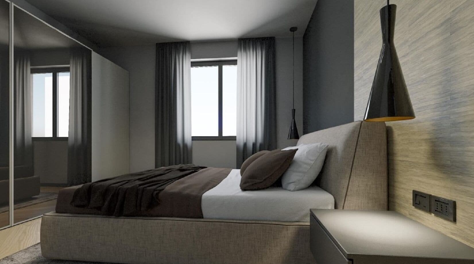 Una cassaforte in camera, una scrivania, tende oscuranti