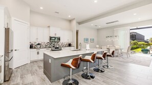 Fridge, microwave, oven, stovetop - Spectacular home with western exposure, heated pool and spa (Marco Island)