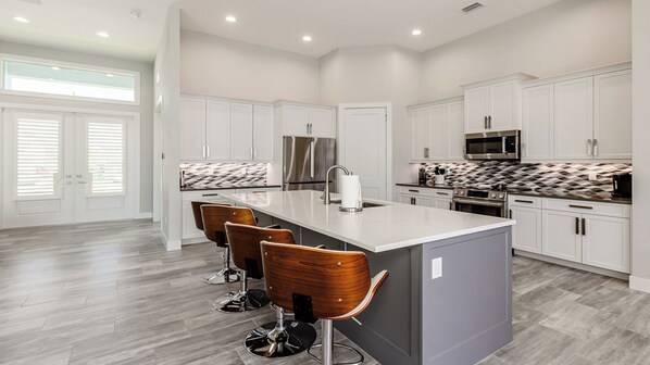 Fridge, microwave, oven, stovetop - Spectacular home with western exposure, heated pool and spa (Marco Island)