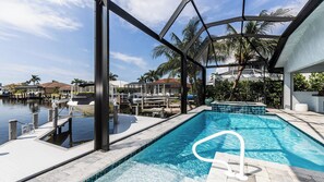 Outdoor pool, a heated pool - Spectacular home with western exposure, heated pool and spa (Marco Island)