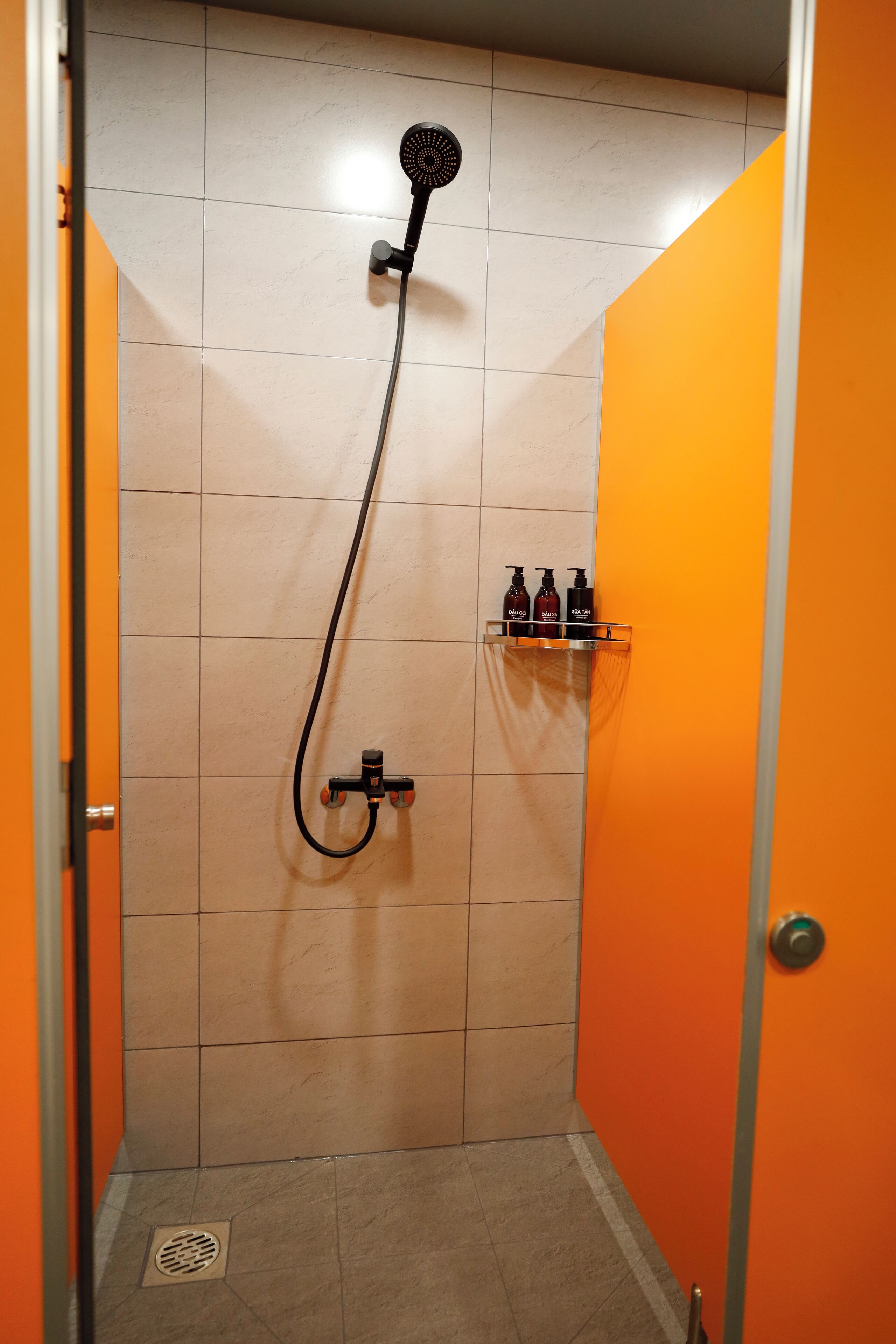 Bathroom | Rainfall showerhead, hair dryer, slippers, towels