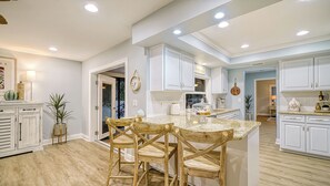 Fridge, microwave, oven, stovetop - Casa Del Mar - Pet Friendly House on Siesta Key w/ Outdoor Patio & Private Screened-In Heated Pool! (Sarasota)