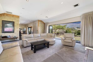 Smart TV, fireplace, DVD player, stereo