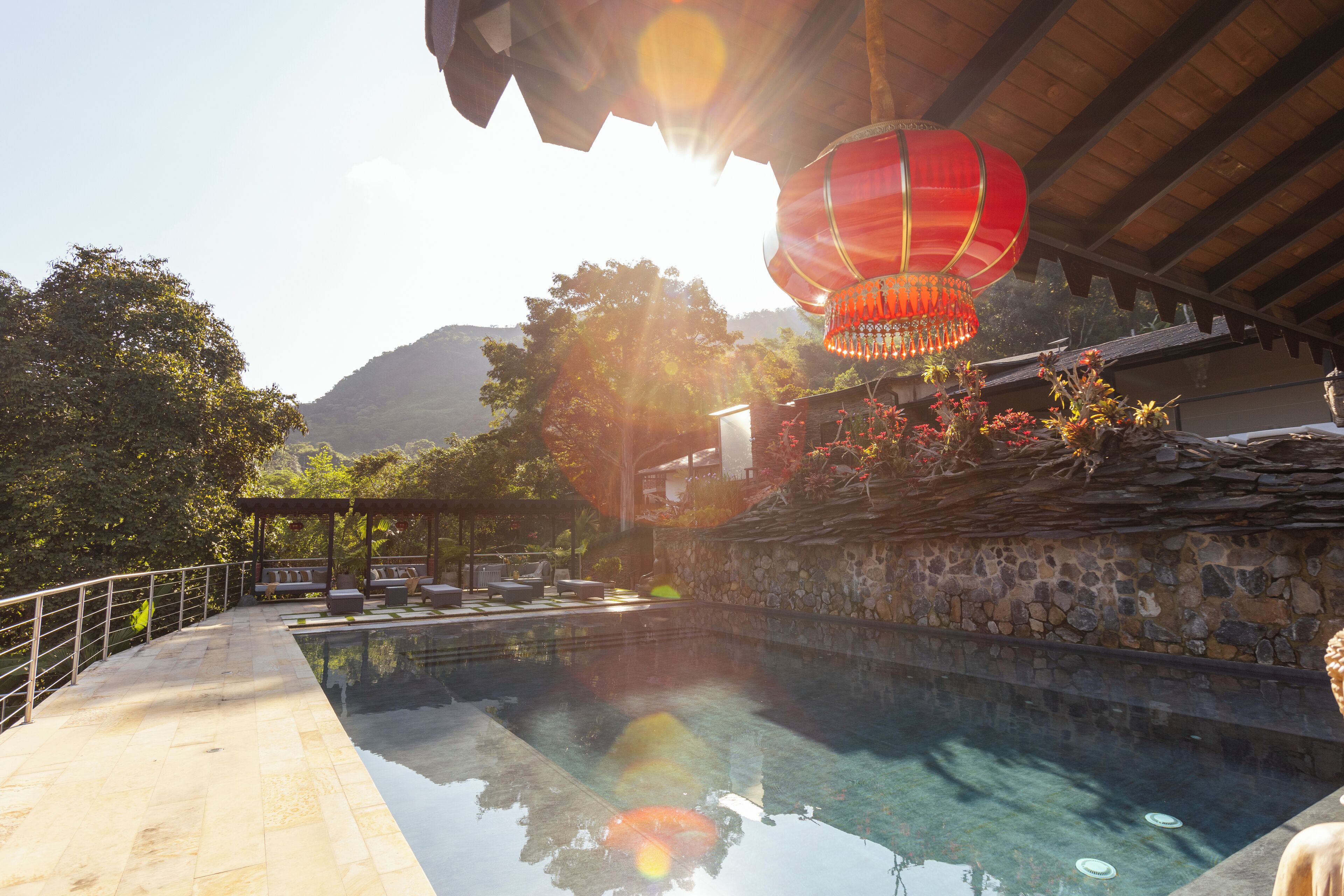 4 outdoor pools, open 8:00 AM to 10:00 PM, pool umbrellas, pool loungers
