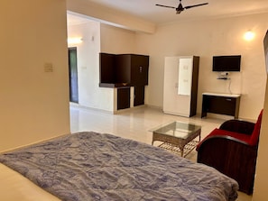 Chambre Double Deluxe, vue ville | Coin séjour