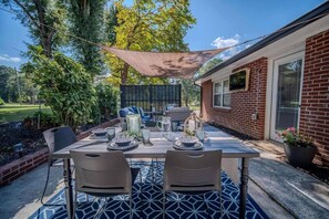 Outdoor dining - Parkside Place: Spacious 3BR Home with Game Room & (Acworth)
