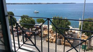 Family Apartment, 2 Bedrooms, Sea View, Beachside | Living area | Flat-screen TV