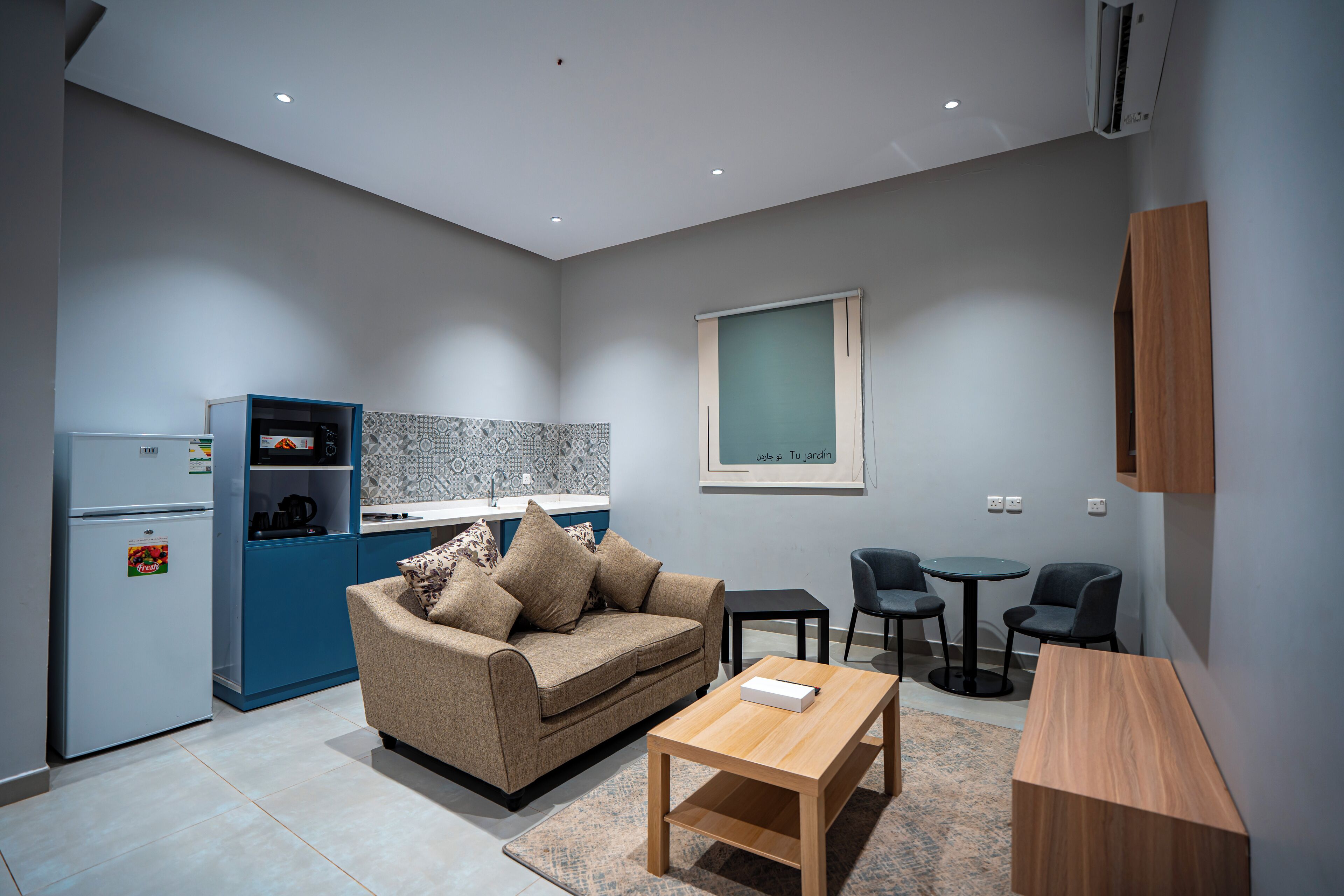 Family Apartment | Living area | 50-inch Smart TV with satellite channels