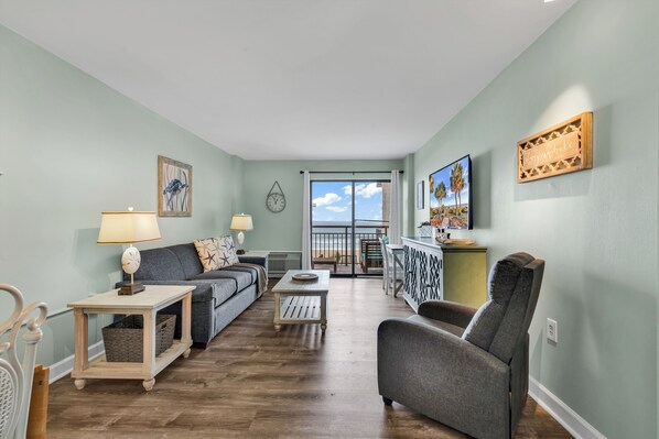 Comfort Condo, 1 Bedroom, Balcony, Beach View | Living room | 32-inch Smart TV with cable channels - Bluewater Resort 207 (Myrtle Beach)