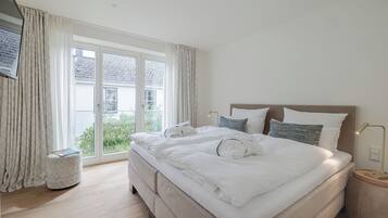 2 kamar tidur, setrika/meja setrika, dan Wi-Fi gratis