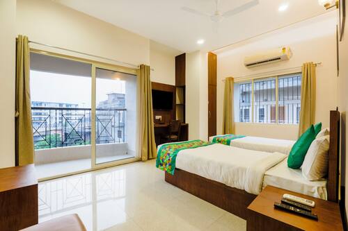 Deluxe Double Room | Desk, blackout curtains, iron/ironing board, bed sheets