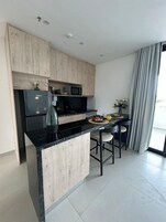 Full-size fridge, microwave, oven, stovetop