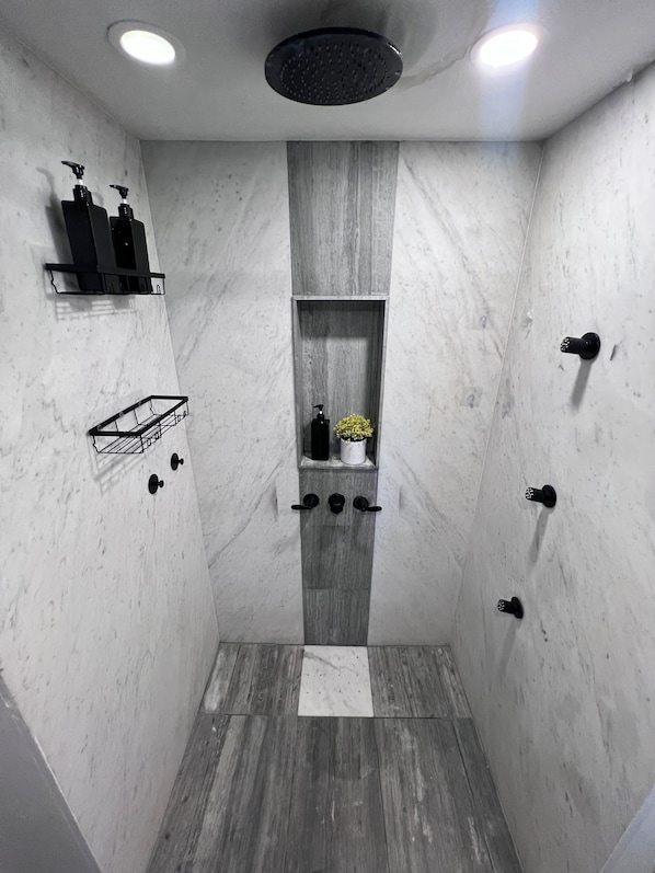 Shower, hair dryer, towels, soap