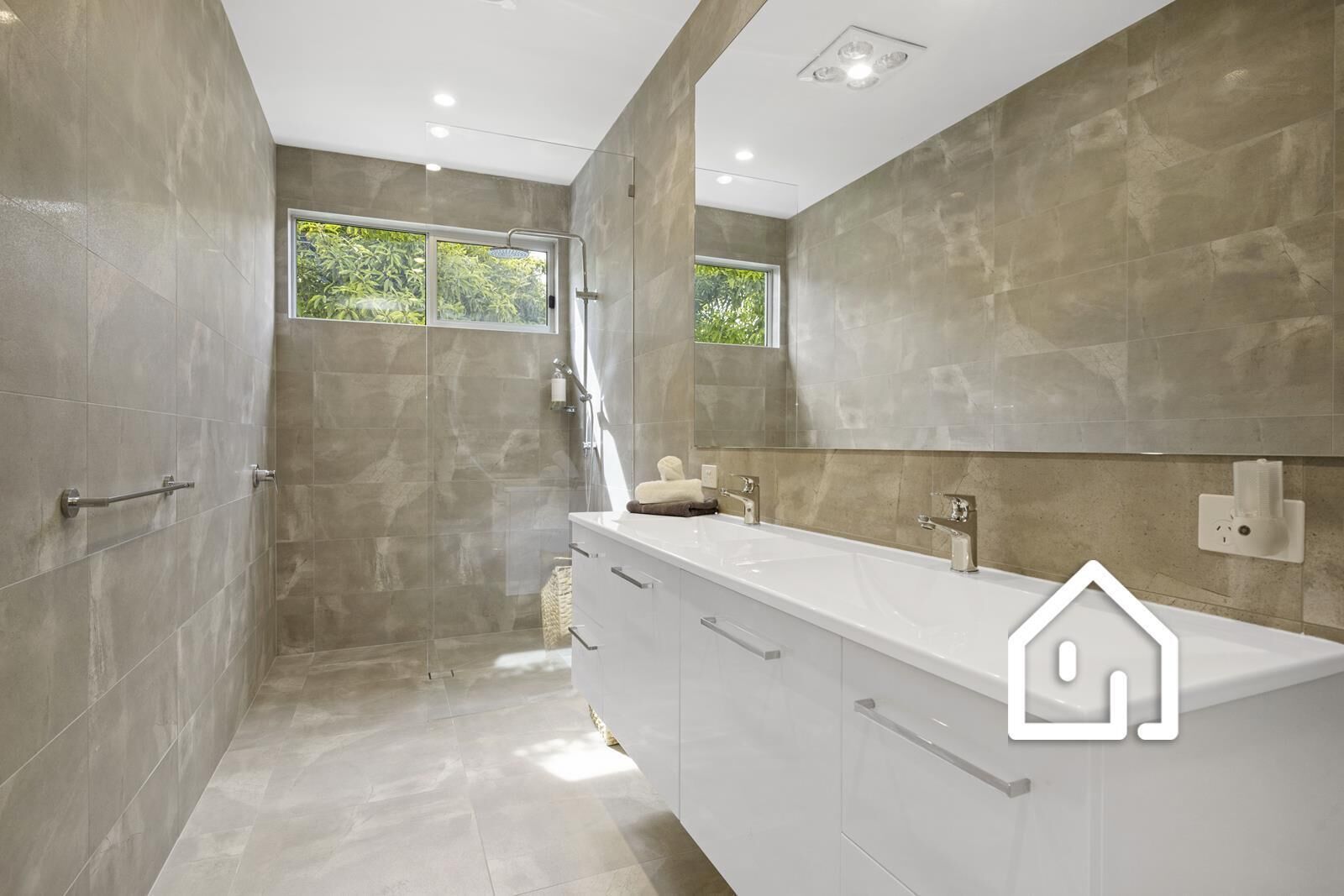 Shower, hair dryer, towels, toilet paper