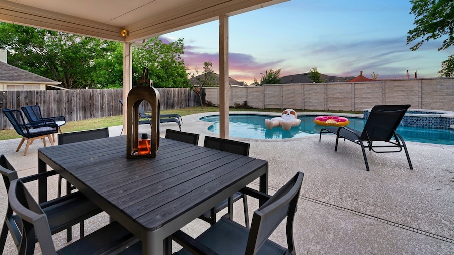 The Mad Hatter Heated Pool Gameroom