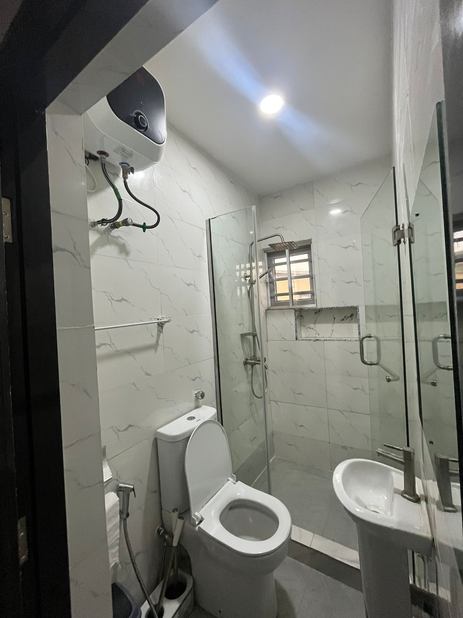 Shower, towels, toilet paper