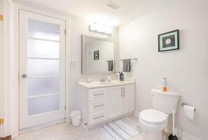 Hair dryer, towels, soap, shampoo