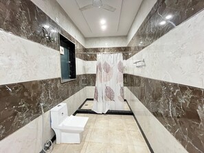 Shower, towels, soap, shampoo