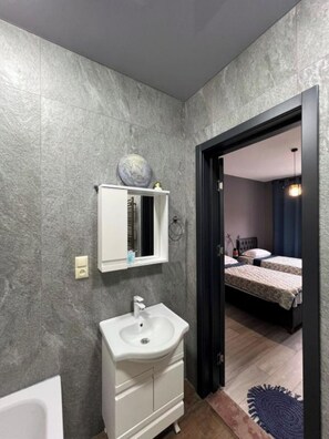 Shower, towels, toilet paper