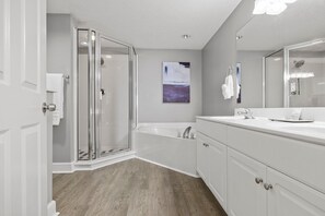 Shower, jetted tub, towels