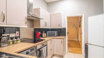 Apartment | Private kitchen | Fridge, microwave, oven, stovetop