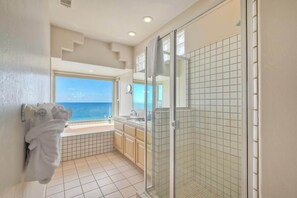 Shower, hair dryer, towels, shampoo