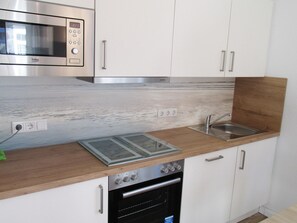 Apartment | Private kitchen | Highchair - Ferienwohnung im Erdgeschoss in Nessmersiel (Dornum)