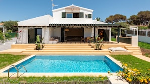 A modern two-story house with a swimming pool, outdoor seating area, and a covered patio. - 3 Bedroom Villa, Private Pool, 500m to Binisafua Beach (Binisafau)