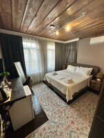 Deluxe Double Room Single Use, 1 Bedroom, City View | Premium bedding, memory foam beds, minibar, individually decorated