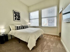 2 bedrooms, desk, iron/ironing board, travel crib