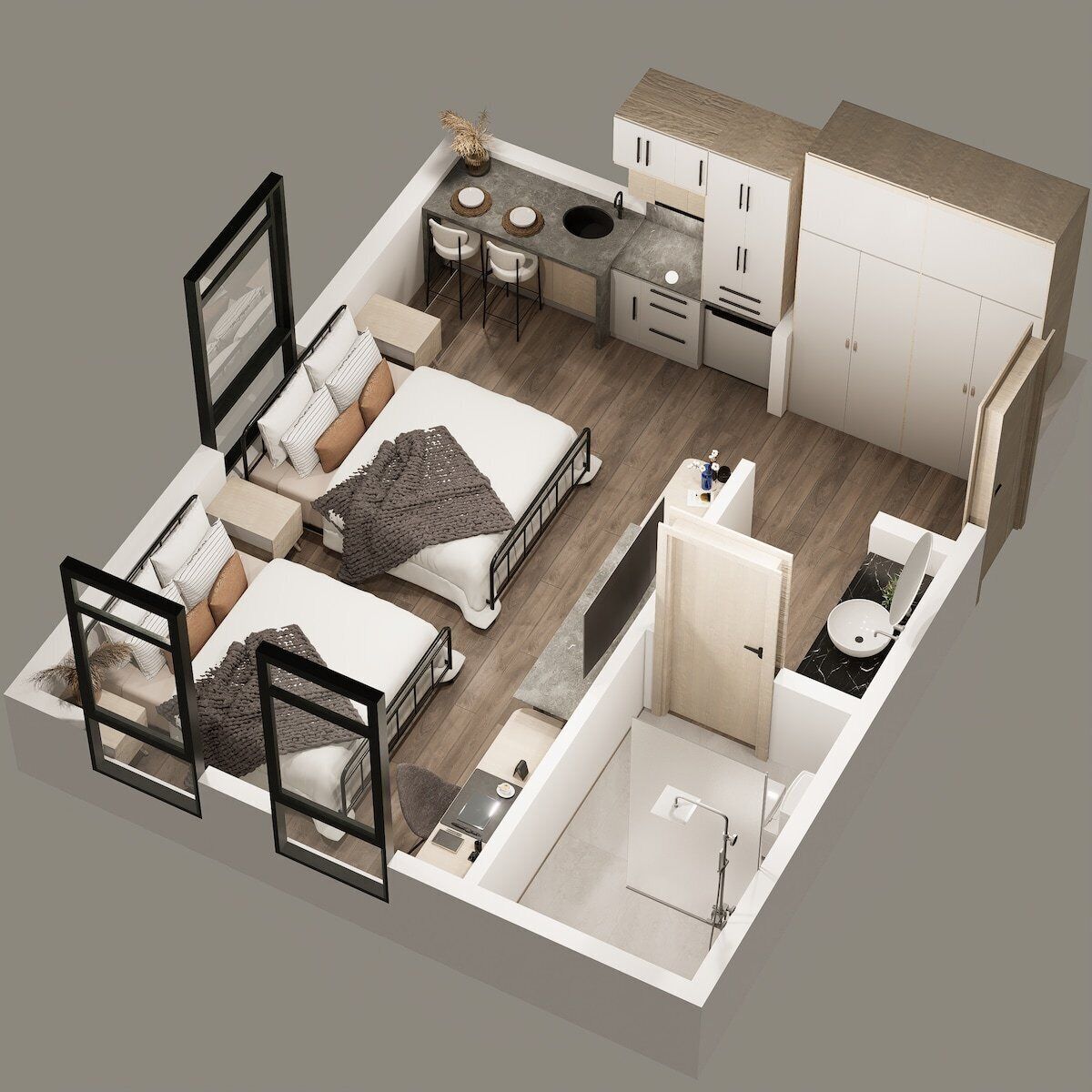 A compact studio apartment with a kitchenette, a small dining area, a bed, a bathroom, and a TV.
