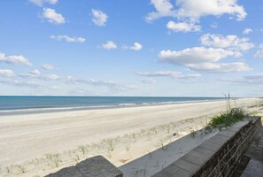 On the beach, sun-loungers, beach towels