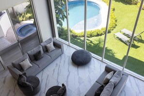 Villa Luxe, vue jardin | Coin séjour