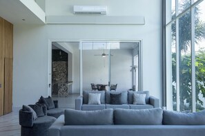 Villa Luxe, vue jardin | Coin séjour