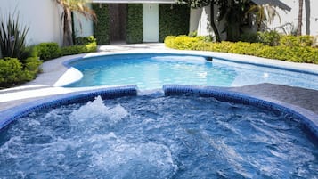 Outdoor pool, pool umbrellas, pool loungers