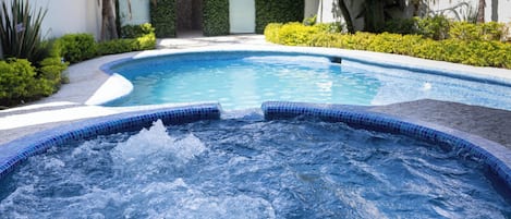 Outdoor pool, pool umbrellas, sun loungers