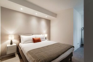 2 dormitorios, tabla de planchar con plancha, wifi gratis y ropa de cama