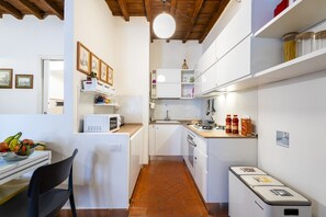 Fridge, coffee/tea maker, cookware/dishes/utensils