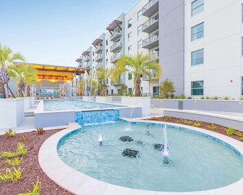 Enjoy the splash fountain, perfect for kids and adults to cool off in a fun, interactive way.