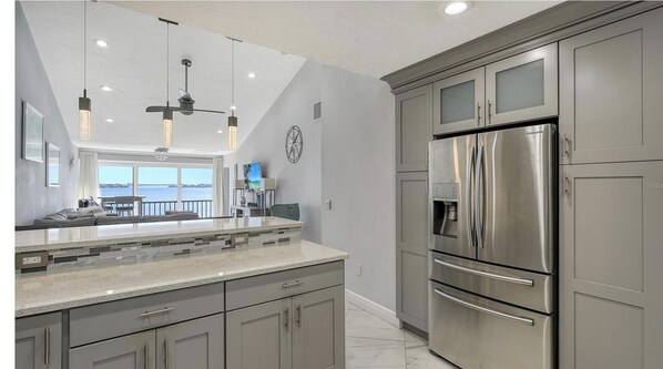 Fridge, microwave, oven, stovetop - Charming 2-bedroom condo in vibrant Sarasota, just a short walk to the beach (Sarasota)