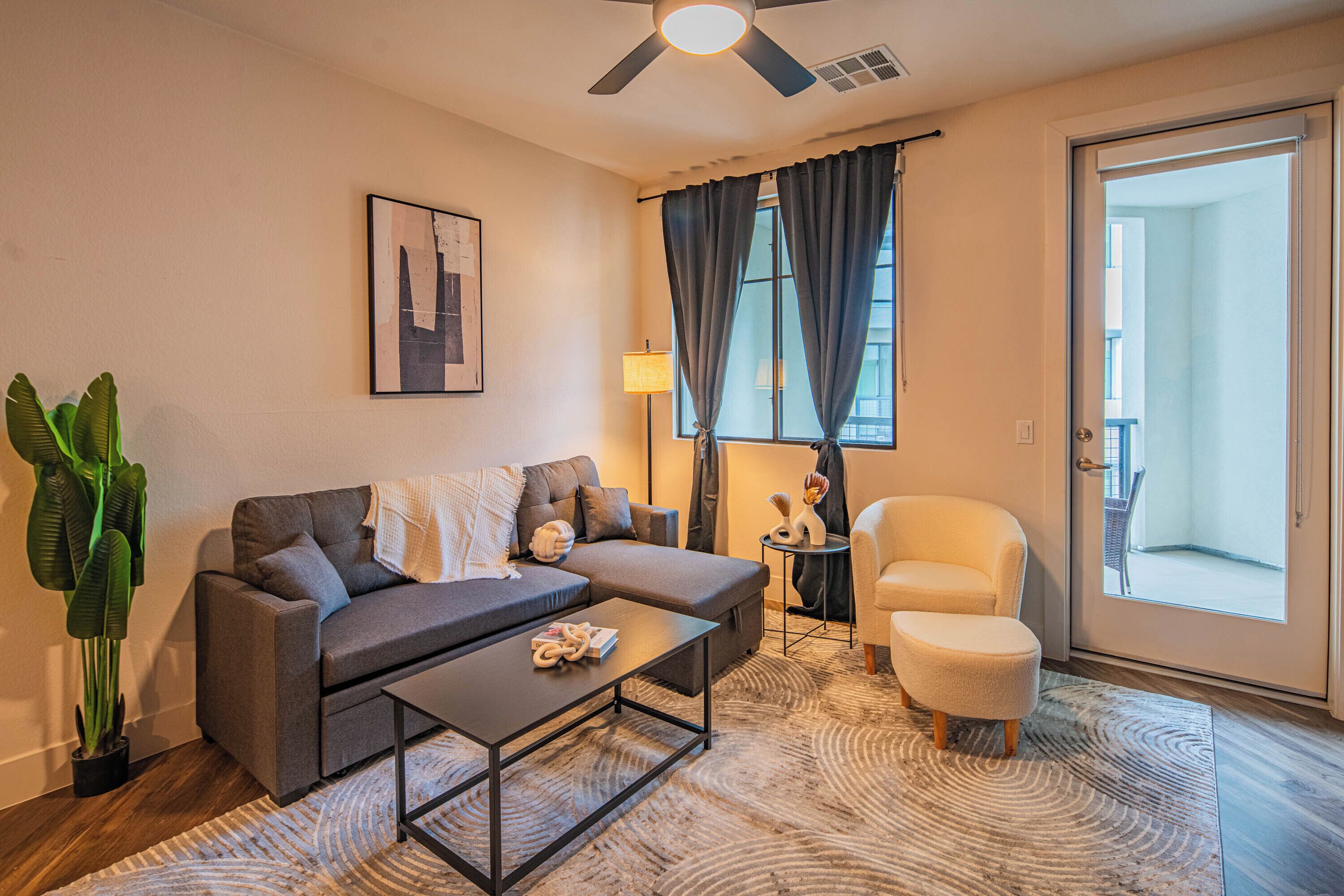 Executive Condo, Balcony | Living area | 55-inch Smart TV with digital channels
