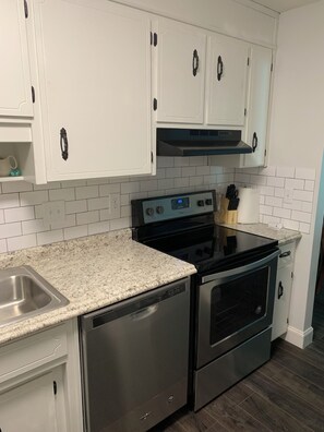 Microwave, toaster, cookware/dishes/utensils